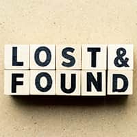 The phrase Lost & Found written with wooden blocks